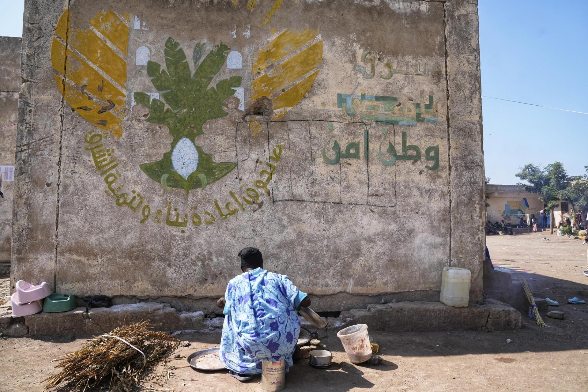 Inscription peinte sur un mur à l'extérieur de l'école Al Tadamon